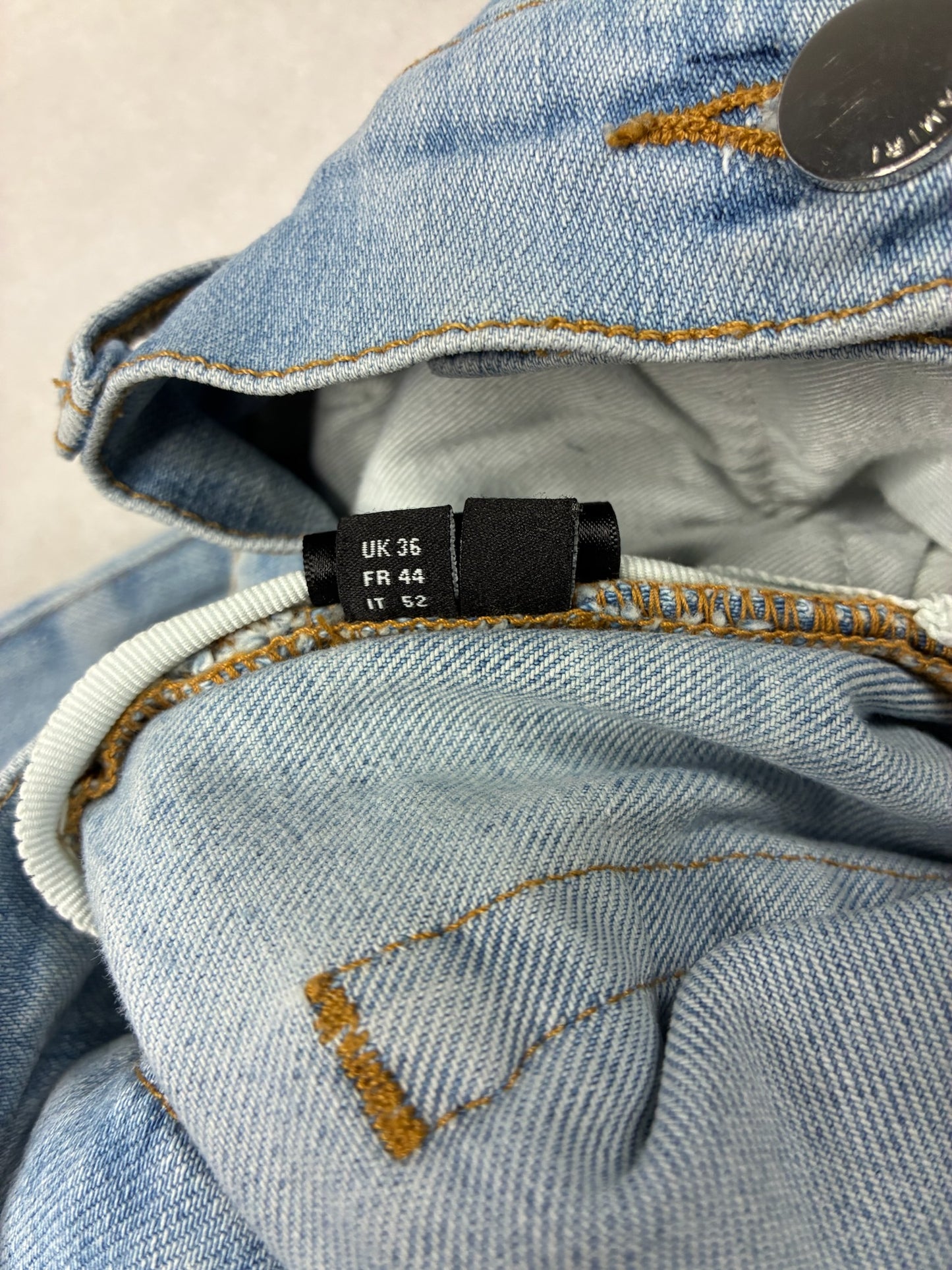 AMIRI MX1 White Patch Distressed Jean