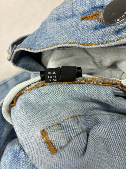 AMIRI MX1 White Patch Distressed Jean