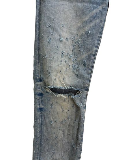 Amiri MX1 Distressed Skinny Jeans