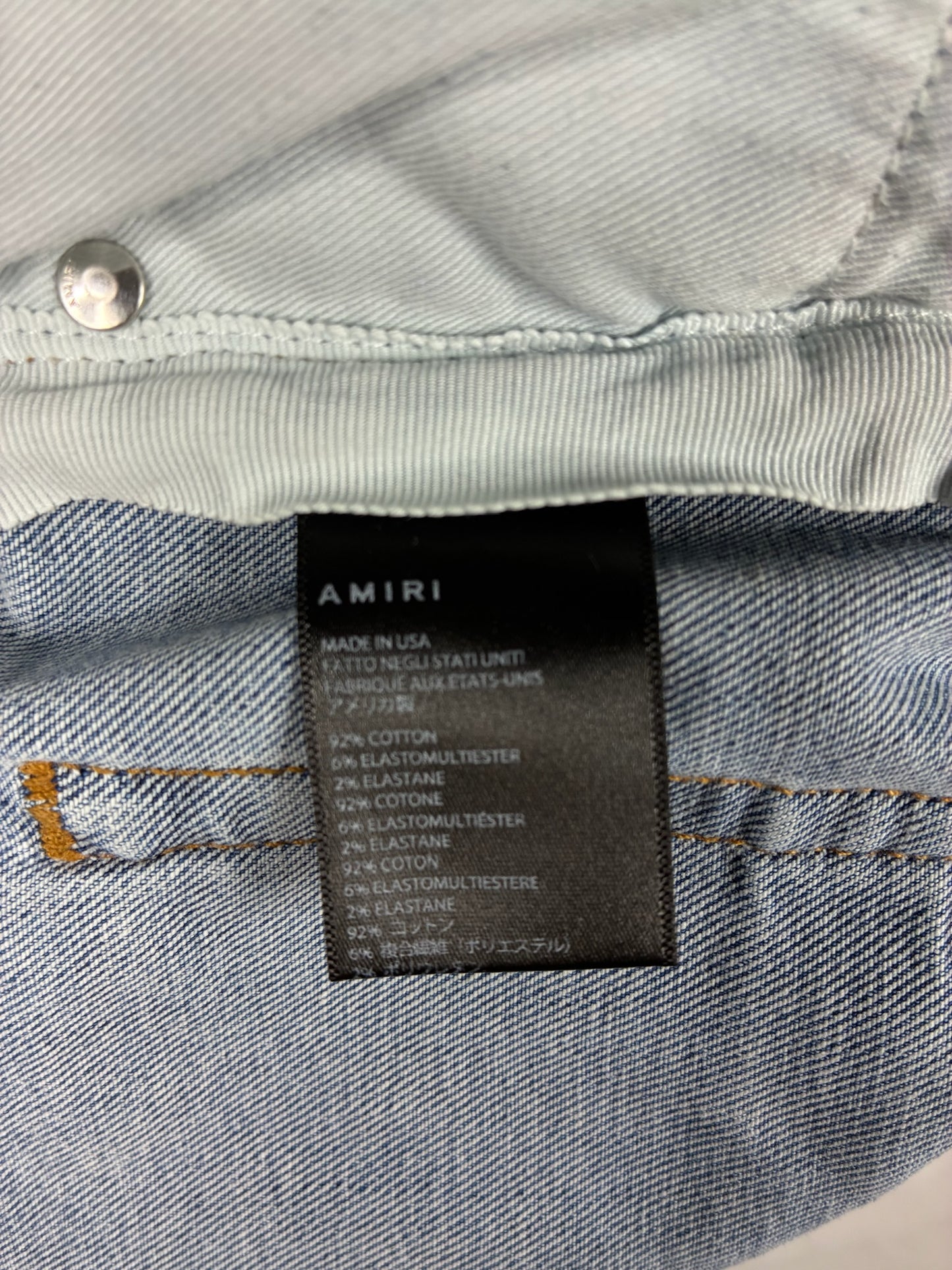 AMIRI MX1 Iridescent Patch Distressed Jean