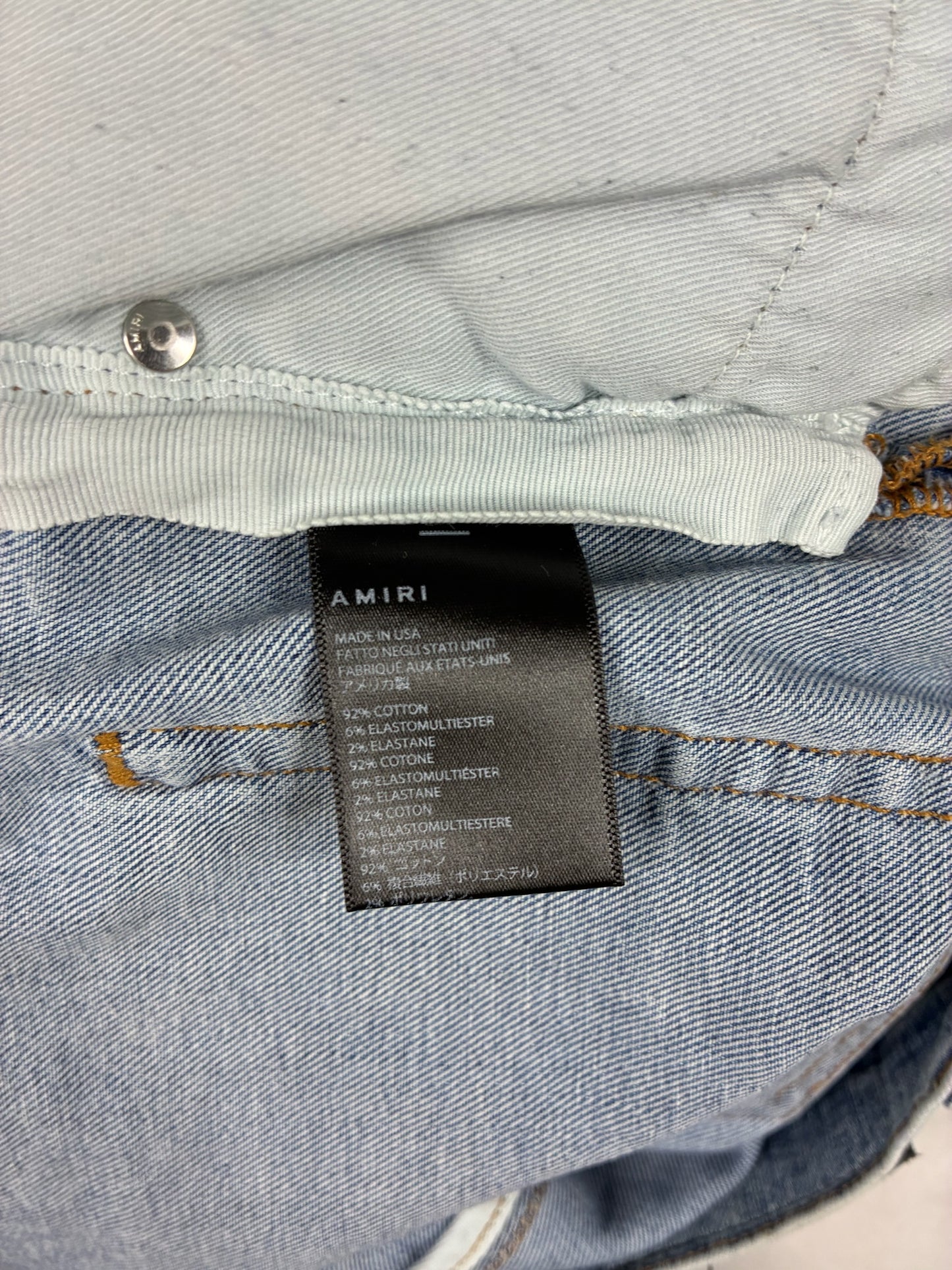 AMIRI MX1 Iridescent Patch Distressed Jean