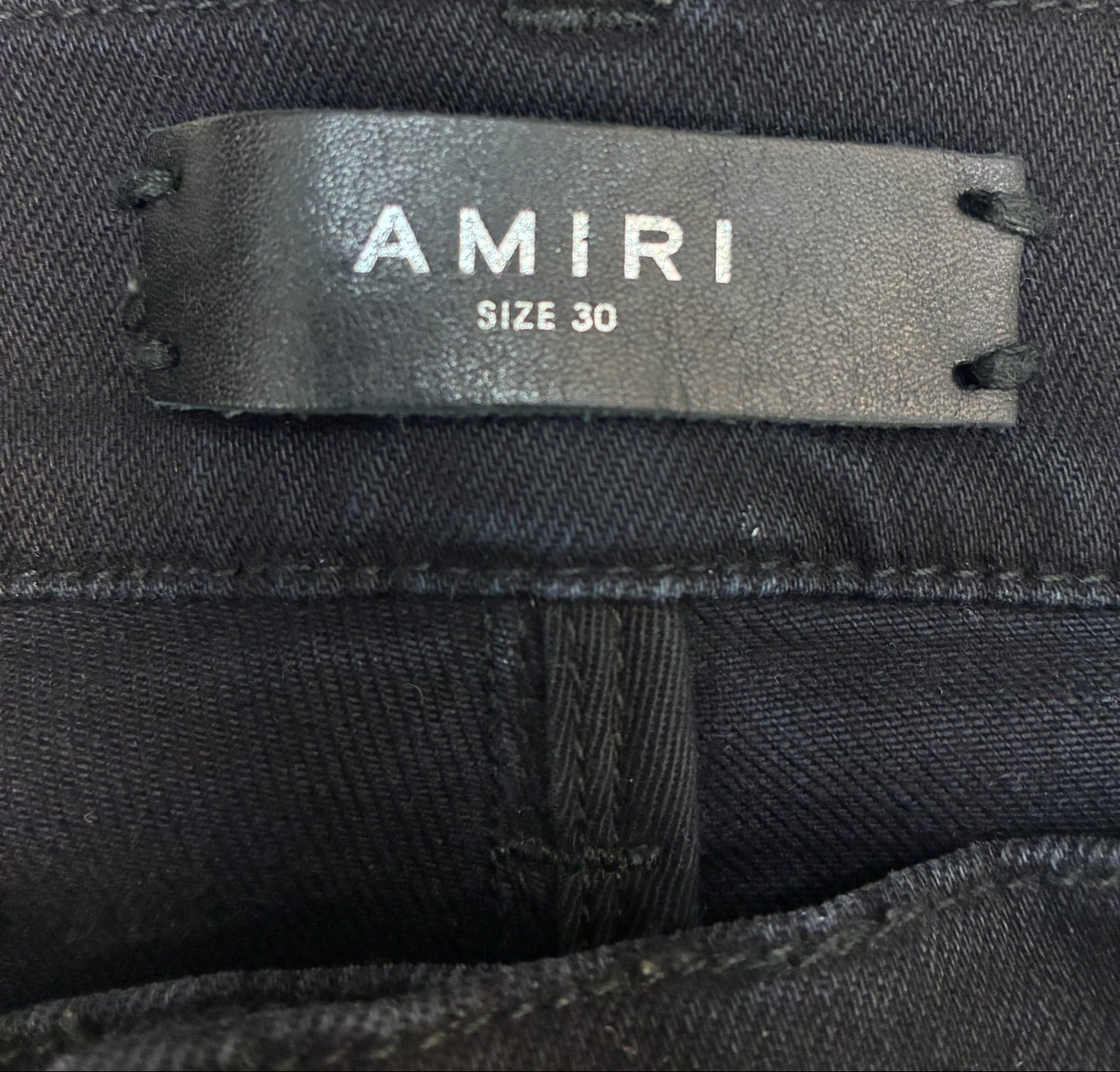 Amiri MX1 Cracked Paint Jeans In aged Black With Blue Patches