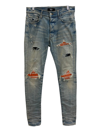 Amiri MX1 Cracked Paint Jeans Orange Patch
